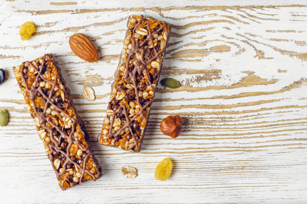 healthy-delicios-granola-bars-with-chocolate-muesli-bars-with-nuts-dry-fruits-top-view_114579-10187.jpg